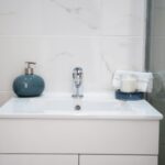 minimalist bathroom shelf hair products