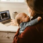 working mom applying makeup