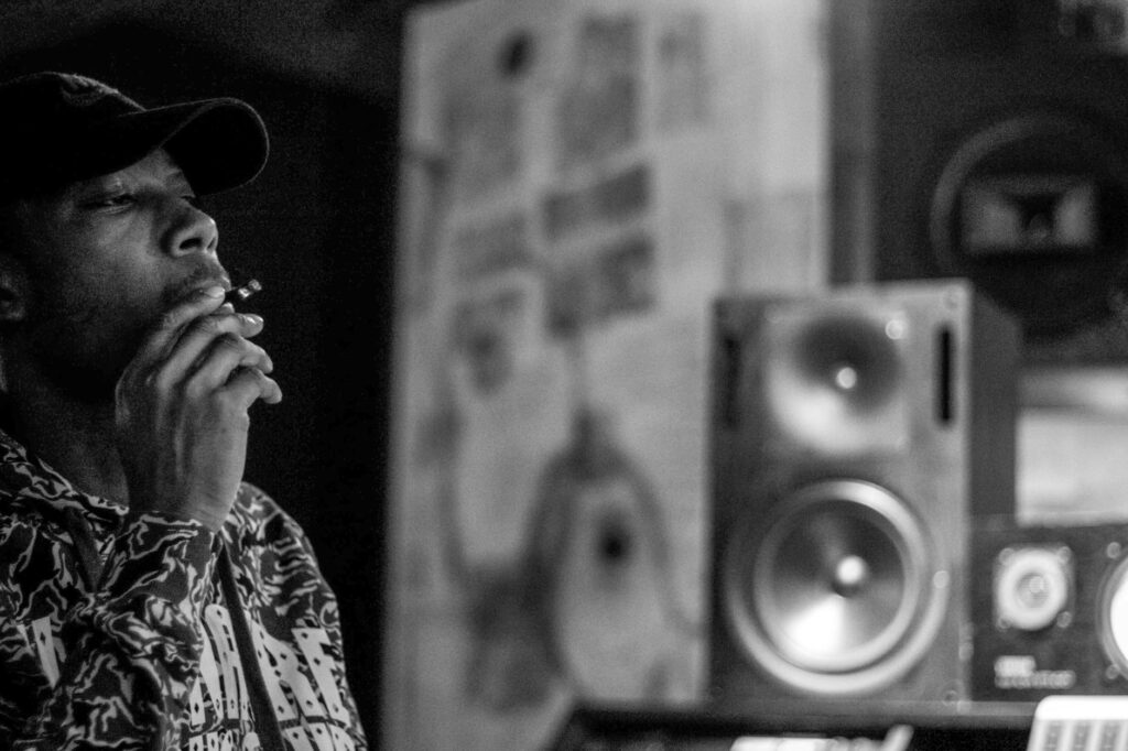 corteiz black cargo pants on model